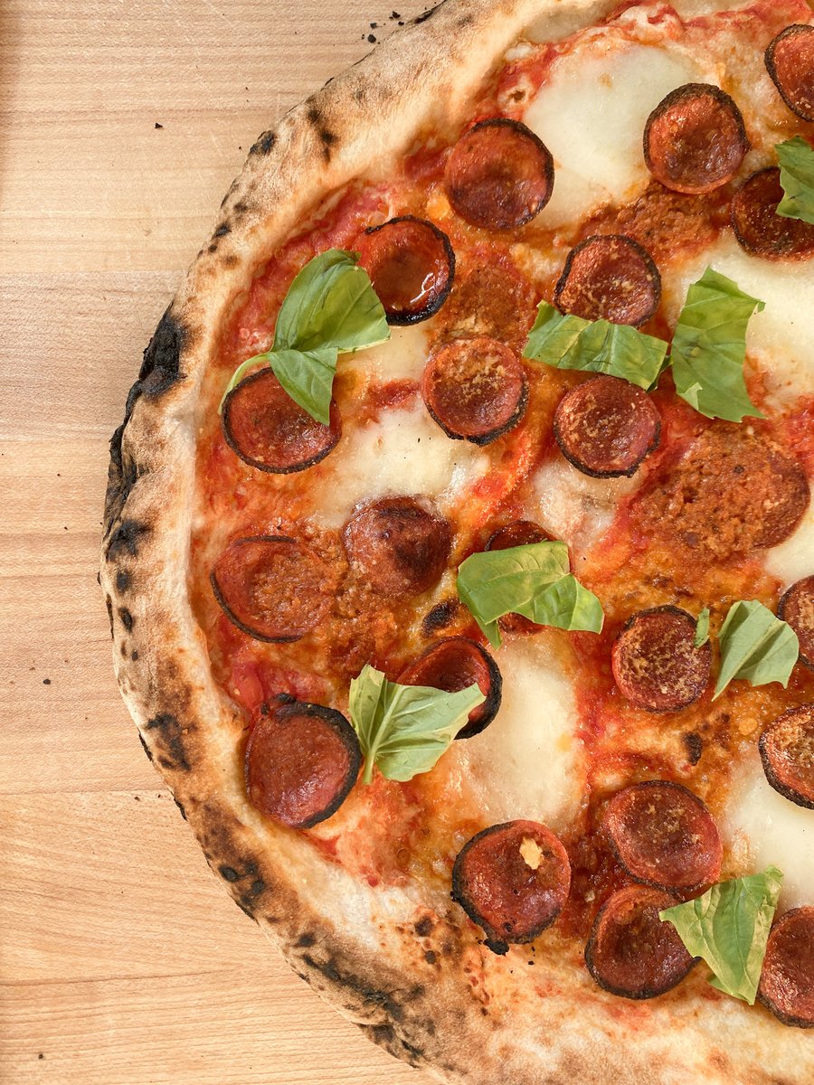 Enjoy our pies fresh from your own oven at home with <a href="/goldbelly/">Goldbelly 🚀</a>! 🍕
Stock up on frozen variations of our customer-favorite pies, including the spicy Bastardo (pictured here). All you’ll need to add is fresh basil to finish the perfect Varuni pie! Link in our bio to order.