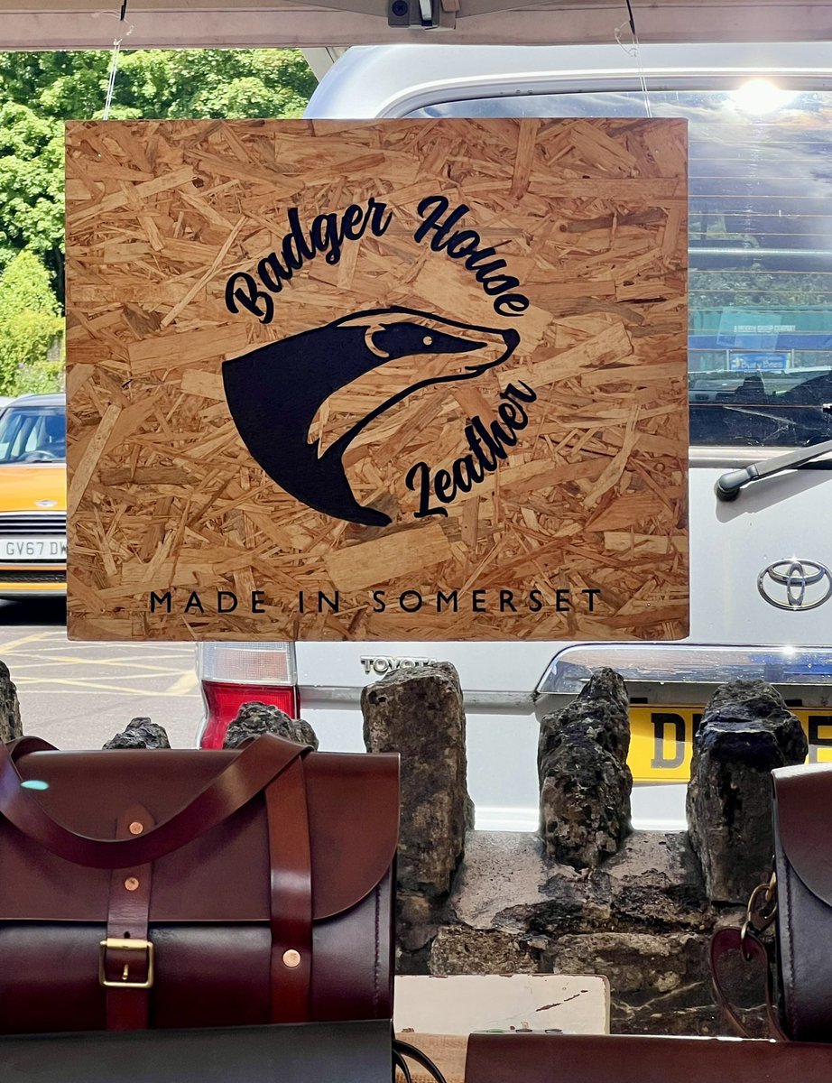 Specialist interest merch at Frome market - how many badgers does it take to make a handbag anyway? <a href="/TheCiderShedPod/">The Cider Shed</a>
