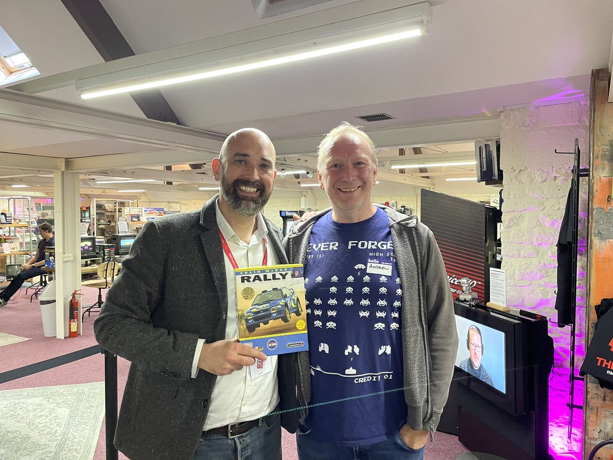 It was a pleasure to chat with <a href="/andrewhague/">Andrew Hague 👾</a> today, designer of Colin McRae’s Rally and many other games at @Codemasters and beyond. 
You never know who you might bump into at The Cave!

(Bonus points to <a href="/HiddenAsbestos/">David Walters</a> for being on the TV behind us)