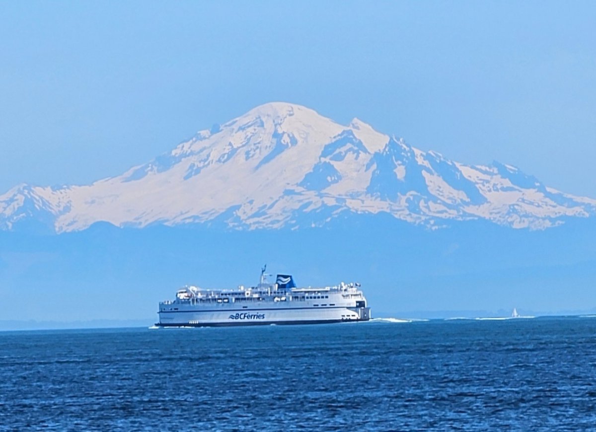 Incredible day to be crossing the Georgia Strait. Just saw this <a href="/BCFerries/">BC Ferries</a> exiting the Active Pass and passing Mt. Baker.  <a href="/HelloBC/">Super, Natural British Columbia</a> #BritishColumbia