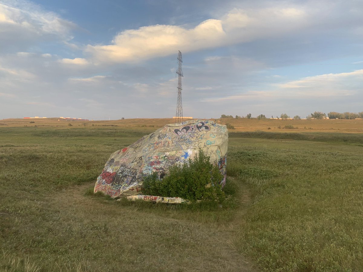 YuleLoveYYC's tweet photo. We have our own Sacred Rock in Nose Creek.  Instead of blowing it up, the gov’t of our day is just neglecting it. Allowing graffiti to destroy ancient pictographs. The Feds need policy to protect natural monuments like Glacial Erratics. @ChahalGeorge #SaveNoseCreek #SNCerratic https://t.co/ycsKFENwzc
