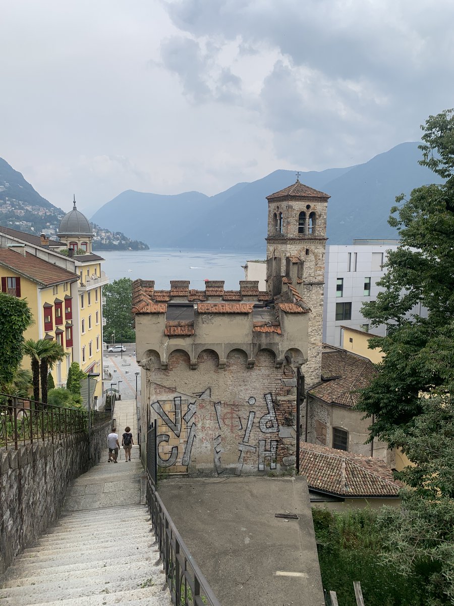 KevinJamesHunt's tweet photo. We passed briefly into Switzerland for a quick stop at Lake Lugano. For some reason I decided it would be a fun idea to see how fast I could climb the 365 stairs. #lugano #italy #travel https://t.co/lbp5ILxcVe