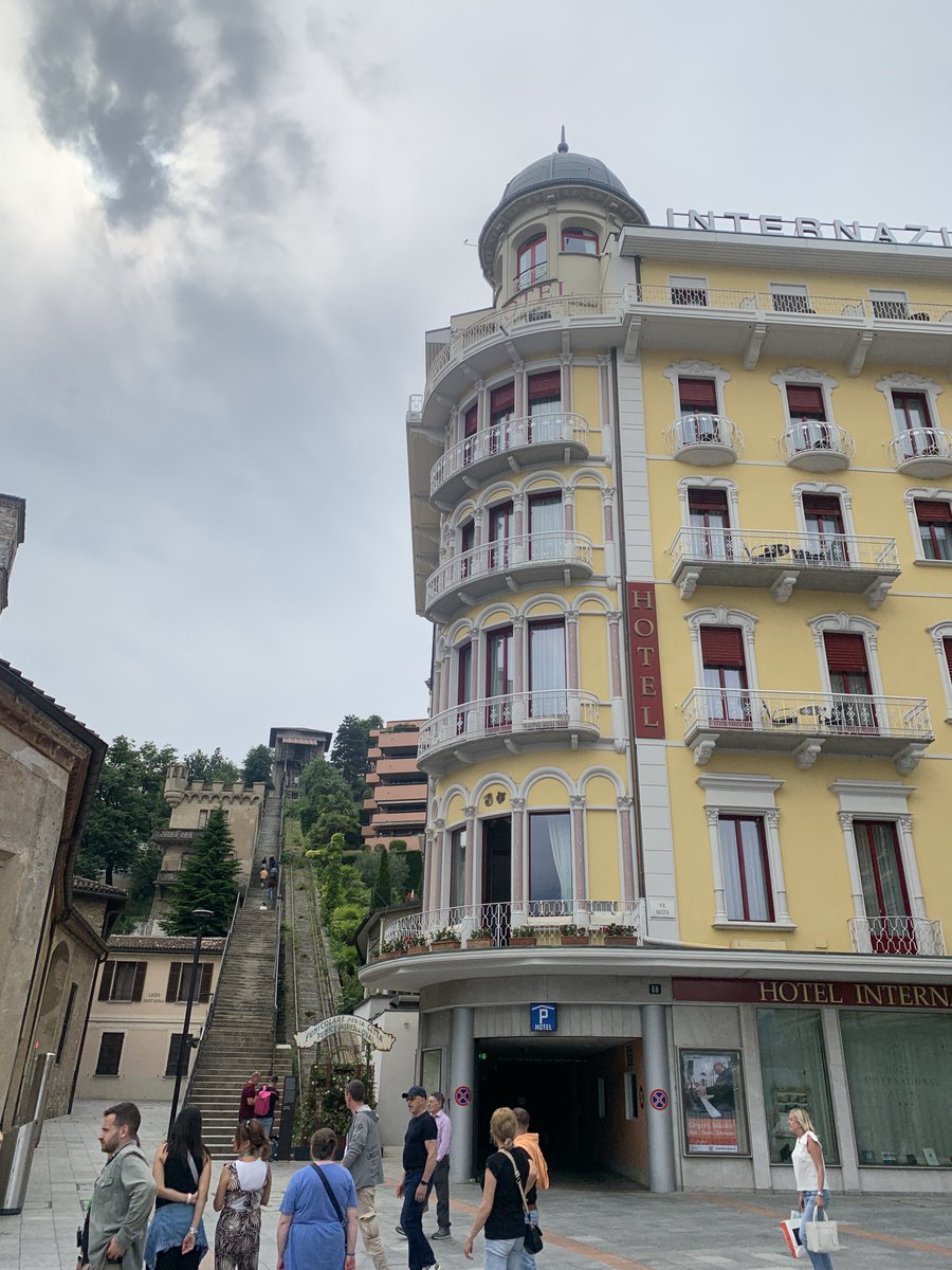 KevinJamesHunt's tweet photo. We passed briefly into Switzerland for a quick stop at Lake Lugano. For some reason I decided it would be a fun idea to see how fast I could climb the 365 stairs. #lugano #italy #travel https://t.co/lbp5ILxcVe