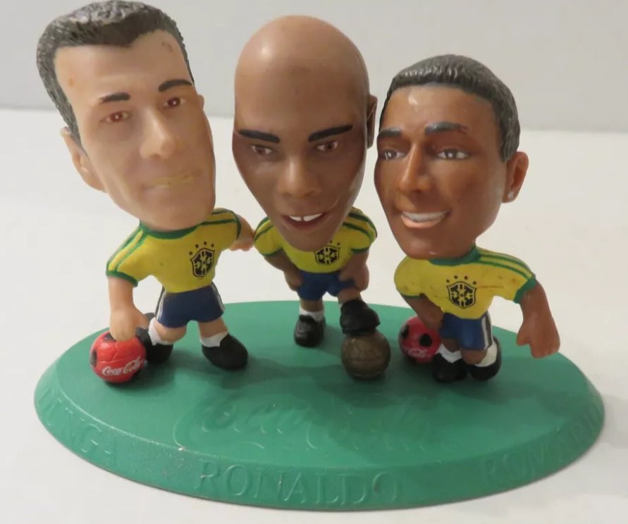 HeadlinerHenry's tweet photo. What is this? 

I’ve never seen 3 players sharing a base before. Looks like a Coca-Cola sponsored release…any info? Is it rare? #CorinthianCommunity https://t.co/NwoOPlDt4d