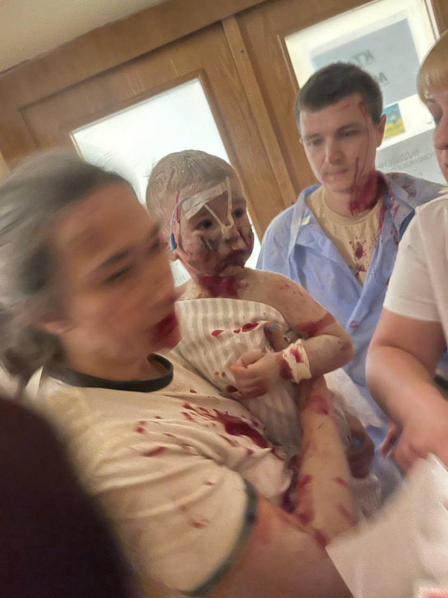 United24media's tweet photo. Children being evacuated after a Russian missile hit a children's hospital in Kyiv. https://t.co/sqRYwhjoAi