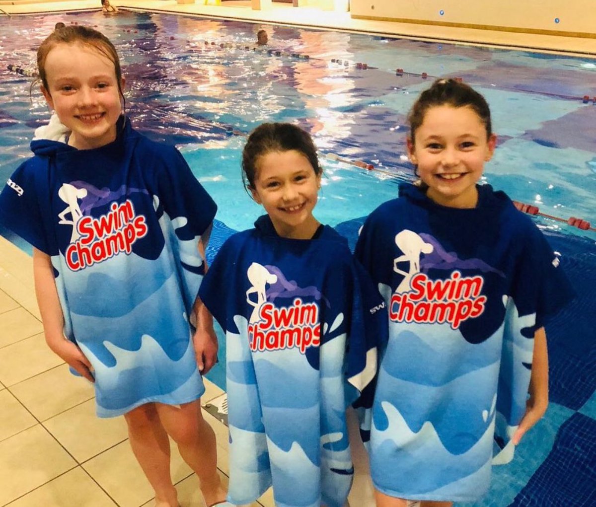 Swimming towel ponchos for sale - great for pool &amp; beach. Easy to put on after lessons, great for keeping warm and changing. £22 each - DM to order yours. SWIMZI design #poncho #swimchamps #repthebrand #swimmingtowel #swimminglessonattire