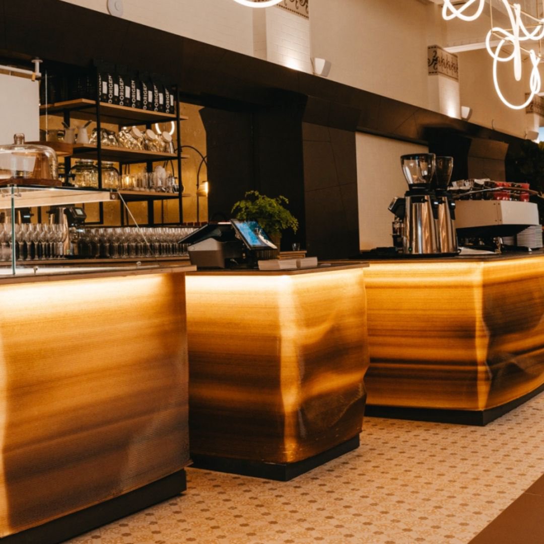 A Coffee Shop made of Coffee Grounds?

In Barcelona, <a href="/DOrigenCoffee/">D·Origen Coffee</a> introduced a coffee shop where the furniture is 3D printed with coffee grounds! 

The project showcases sustainable reuse of coffee waste, transforming it into functional design elements.