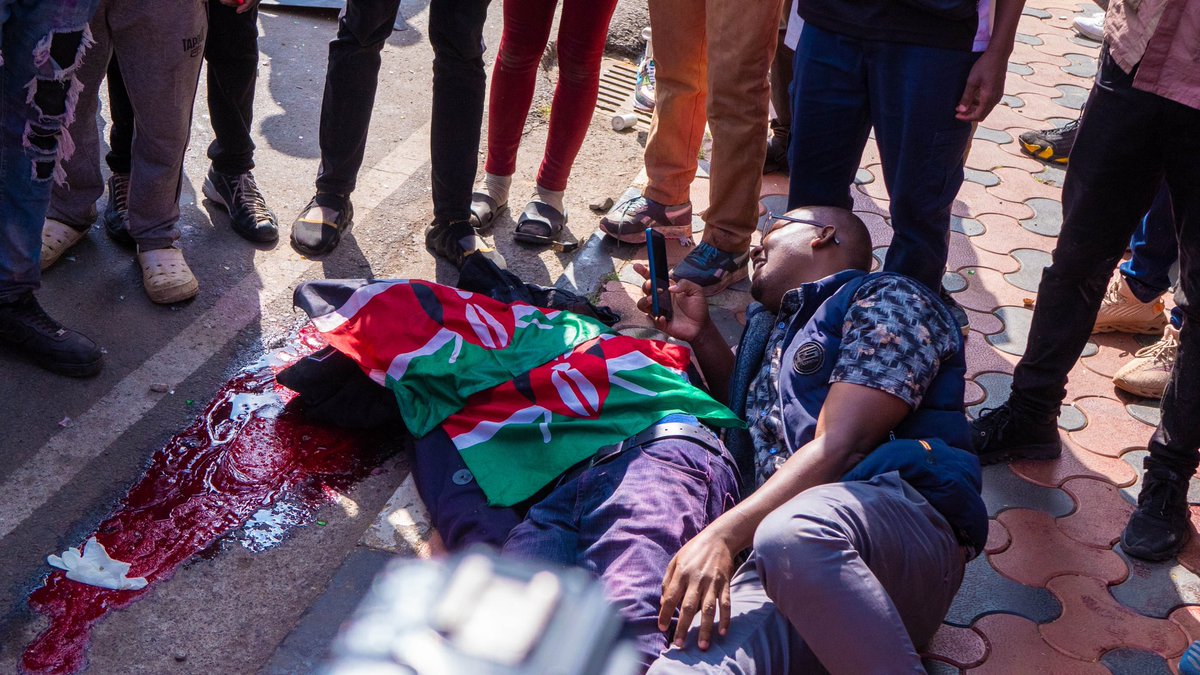 bonifacemwangi's tweet photo. Who stands to benefit from the violence?

My wife Njeri and l couldn’t sleep, along with I believe many other Kenyans, just thinking about what happened yesterday and wondering what comes next. We have tossed and turned all night in grief.

It’s a dark day of mourning for our country. Parents are mourning the loss of their children. Children have lost their parents. Many have lost property through the plunder and senseless destruction. We have many wounded across the country, whose lives have forever been altered.

My heart is heavy with grief and sadness. We have been here before. Many times. Where citizens complaining or protesting of particular grievances are targeted, and punished, as the government ignores the cries and concerns of its people.
What makes yesterday particularly horrifying is the events that led to that particular protest. There were two very peaceful protests last week.  No matter the provocation by the police, the peaceful protestors did not respond to the violence meted against them. They exercised their right as enshrined in the Constitution, peacefully and unarmed.

The same could not be said of the police. Rex Kanyeki was shot after the protest had ended, and people were attempting to return to their homes. The police chased and shot him as he was fleeing – there was no threat to them. Rex died from excessive bleeding less than an hour later.
Yesterday’s protest was very simple, we go to Parliament and protest peacefully as members of Parliament voted, but the plans to peacefully occupy Parliament didn’t involve invading it. Just like in the preceding two protests, there was to be no violence at all.

We woke up yesterday morning to the news of abductions. A law-abiding State does not abduct its own people. People were angry and demanded for the release of those who had been abducted during the night. The State appeared to have a plan aimed at provoking people.

We are in country where the State and its political accomplices will finance and organize violence, and then turn around and blame innocent citizens. We’ve seen this happen many times before and the end-game is to justify a violent clamp-down by the State.
Yesterday, there were pictures and posts circulating online saying that some ruling party politicians had hired goons to infiltrate the protests. Some of the crowd that was in the streets yesterday were part of that group. Anyone who had attended the preceding protests could easily notice that.

After 4pm, we started telling people to go home. l was punched in the face for requesting people to disperse, chased away by a crowd, and was only saved by running into I & M building. l managed to get into the building thanks to the security guys who opened for me. My assault was captured by many people, and if you’re one of those who captured it, please share. Those who assaulted me wanted to break into I & M. The security footage from the building can collaborate this.

The invasion of government buildings, and the fires that were lit all over the city and the rest of the country yesterday, was definitely not the work of peaceful protesters but of paid goons. I have been an activist for more than 15 years, and l have never taken part in a violent protest. I abhor violence in any shape or form. Even when l ran for office and was told I needed to have my own goons, l refused. I want to live, and die with clean hands. I don’t want to ever be responsible for any loss of life. There is no success, wealth, or fame worth spilling someone’s blood to gain. It’s the reason why l have never attended a protest called by a politician in my adult life.

Back to yesterday’s dark events. Police unlawfully shot live rounds at medics, journalists, and peaceful protestors, killing several and injuring many more. Goons pelleted the police with stones, looted, and razed buildings. Those are all criminal activities and the perpetrators should be held accountable.
 #RejectFinanceBill2024