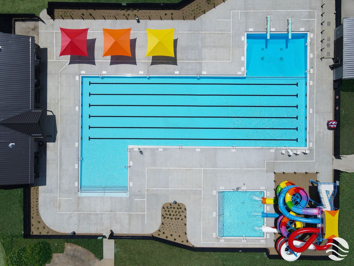 Capri_Pools's tweet photo. Somewhere over the rainbow... Garfield Park is ready for #summer fun! 🌈 The existing #pool underwent a complete renovation including new stainless-steel gutter system &amp; membrane liner, plus the addition of three spiral flume slides, plunge pool, &amp; shade structures. #CapriPools https://t.co/GELO5YaXMs