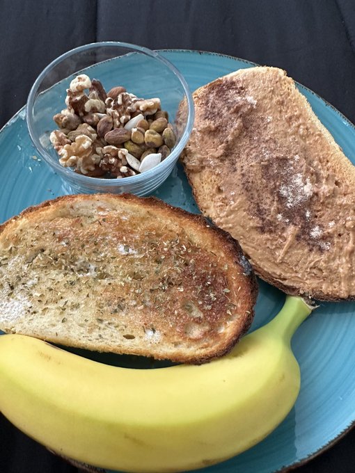 Breakfast: Assorted nuts (almonds,walnuts,pistachios,pumpkin seeds). Toasted sourdough slices, one with<a href="/tag/mvsales"class="tags"><span>#mvsales</span></a>
