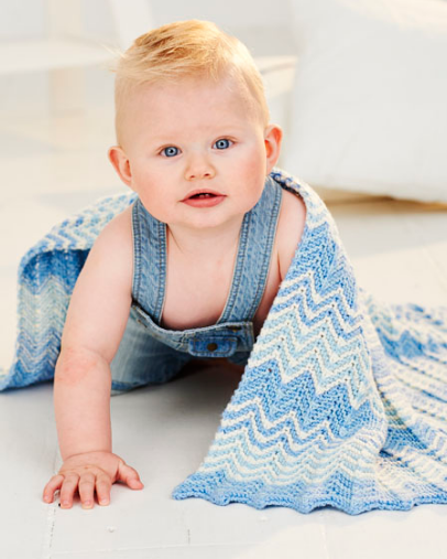 The lovely blues in our Bambino range are perfect for baby gifts. This ZigZag blanket from leaflet 9506 is knitted in Vintage Blue, Little Boy Blue and Cream. The pattern is simple once you get started and looks fantastic.