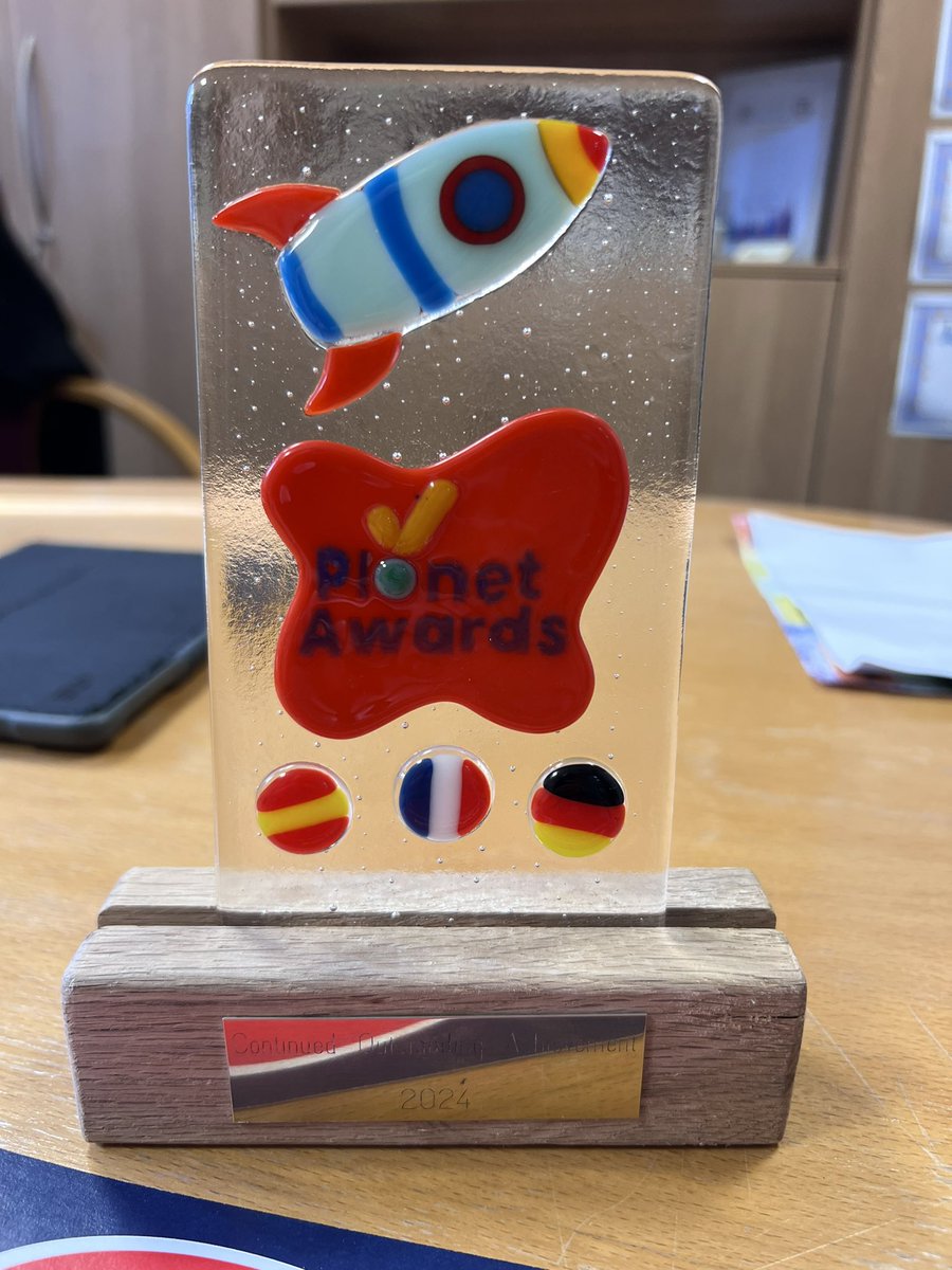 QueensCoEURC's tweet photo. We are beyond proud to receive this award for ‘Continued Outstanding  Achievement’ in Primary Languages.  💙💛 https://t.co/cDTnU8zGkr