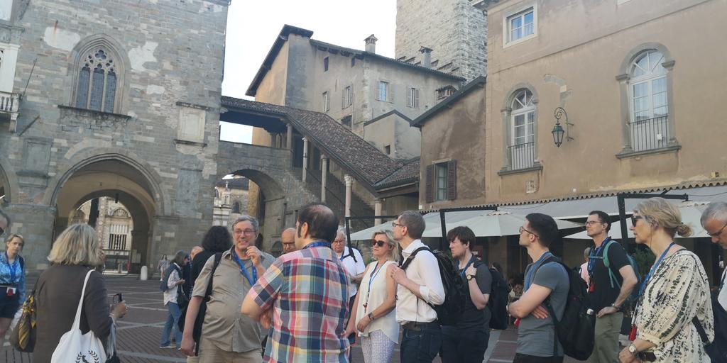 #ABZ2024 participants vising the Piazza Vecchia during the guided tour. <a href="/angelogargantin/">Angelo Gargantini</a> <a href="/fmallet/">Frédéric Mallet</a> <a href="/pscand/">Patrizia Scandurra</a>