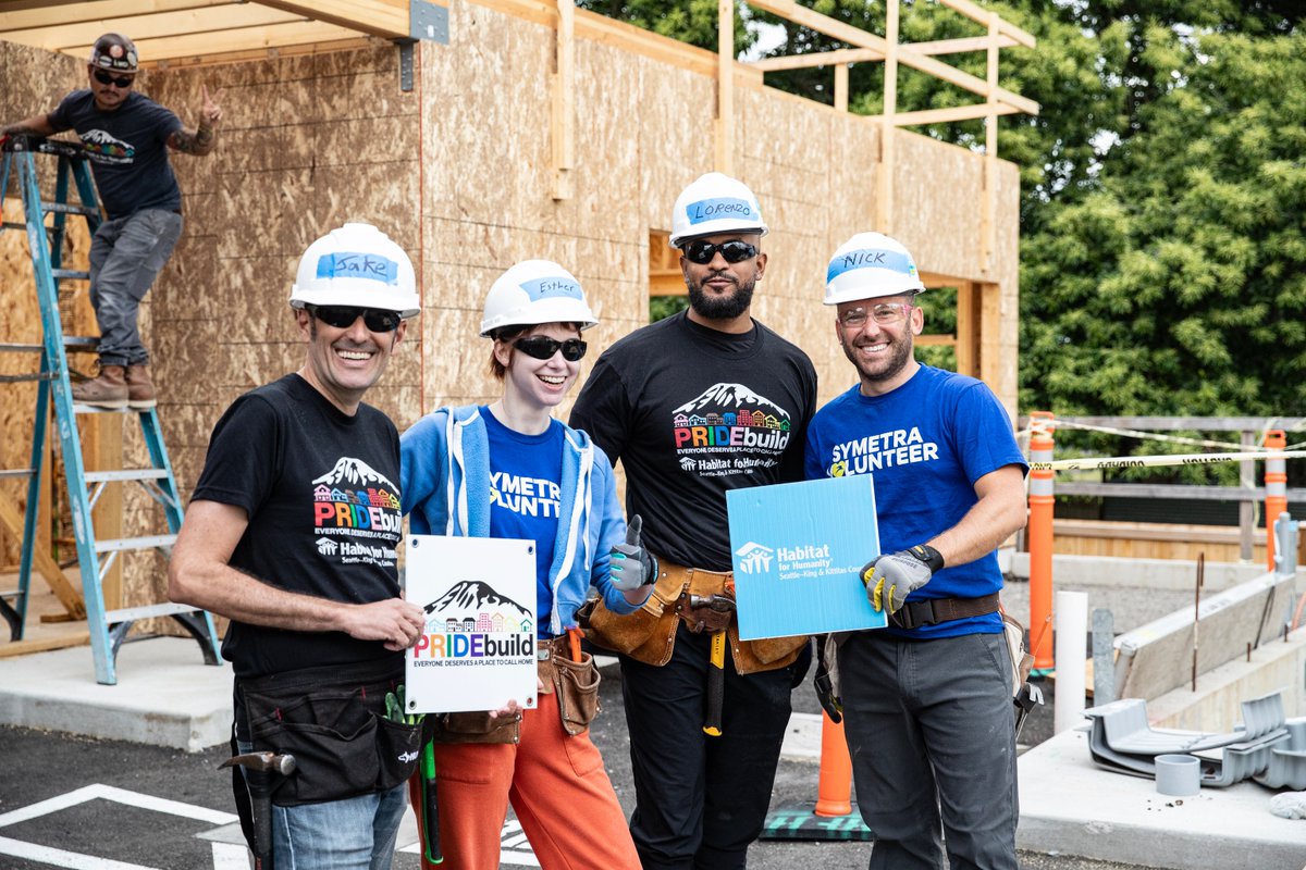 habitatskc's tweet photo. A special thank you to our #PrideBuild sponsors @DWTLaw and @Symetra for joining us at our Yarrow Cottages project for a build day. Your support makes our work possible. https://t.co/WnBoUOZ46s