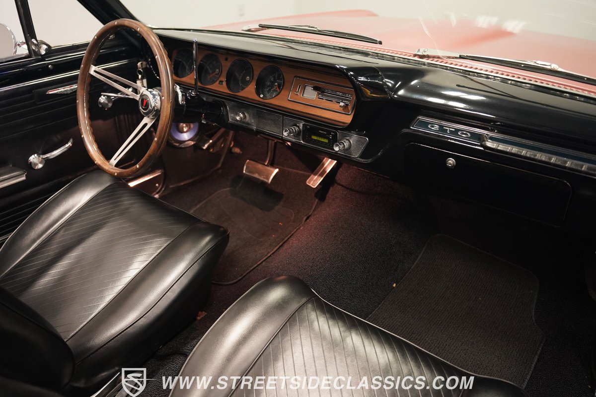 This 1965 #Pontiac #GTO #Convertible features a 389 #V8 paired with an automatic transmission. See more of this car here: streetsideclassics.com/vehicles/4373-…
