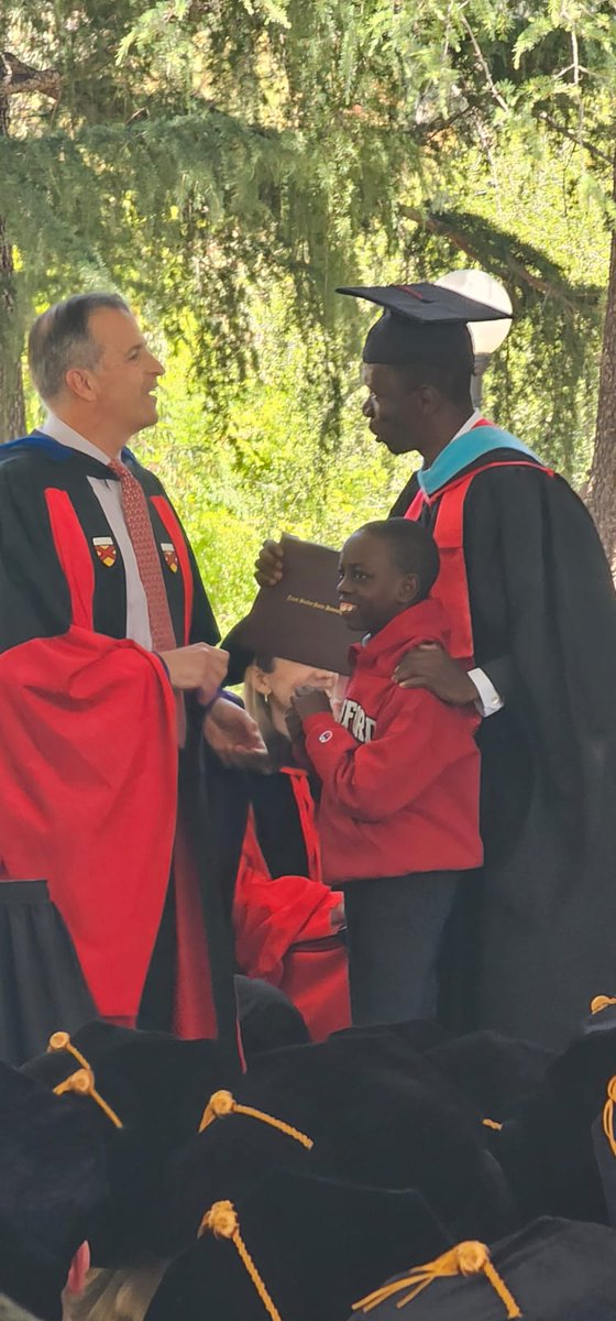 🎊Mr. Robert Kirunda, teaching staff at <a href="/MakerereLaw/">Makerere Law School</a>  completed studies <a href="/StanfordLaw/">Stanford Law School</a> , California, USA and was awarded a Master of Laws in Science and Technology. Orel (in red pullover) is Robert's son; he accompanied the father to the graduation ceremony, great inspiration🎊