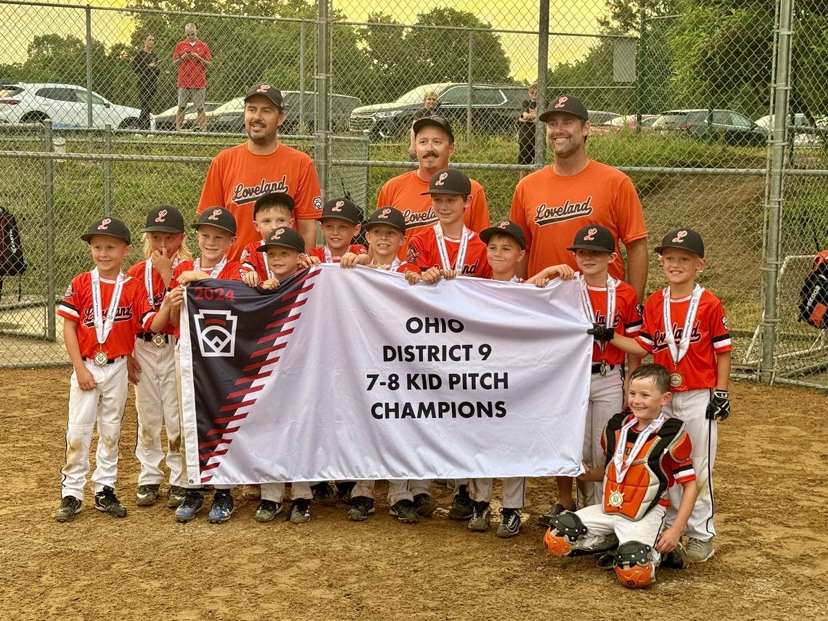 LYBOBaseball's tweet photo. They did it! Congratulations to our Loveland 8U Kid Pitch All Stars for winning the District 9 Little League Championship last night over Mason. Enjoy that banner! 🧡🖤⚾️🏅 https://t.co/ve3jkApTW4