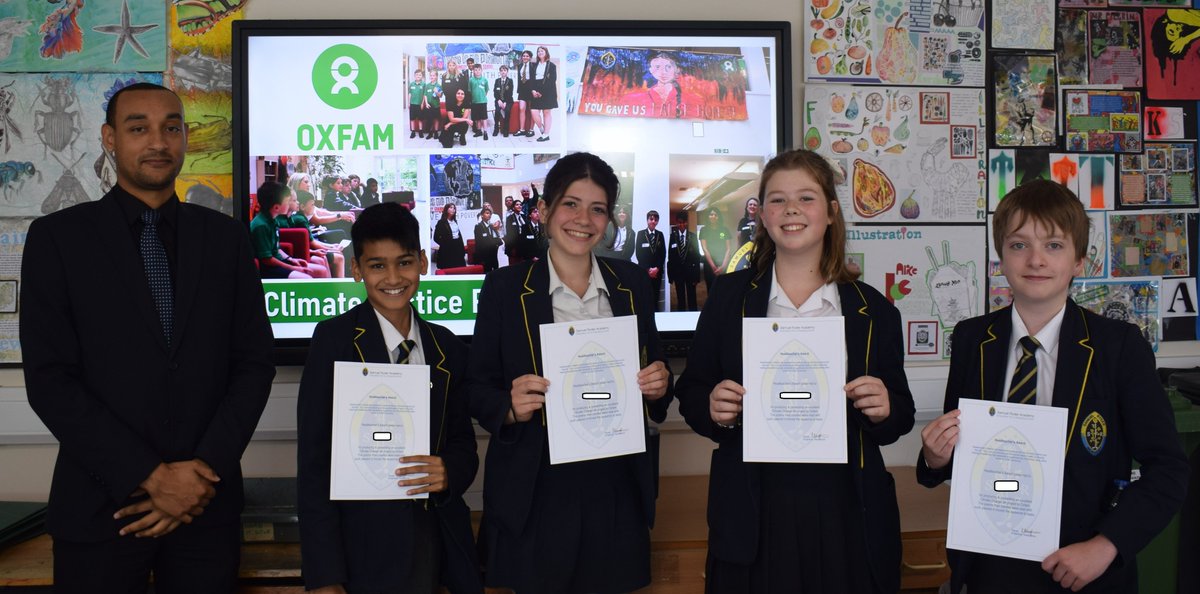 * Headteacher Awards *
Congratulations to students Zak I, Bethany B, Viola D, James B presented with a Headteacher Award for producing &amp; presenting an excellent Climate Change art project to Oxfam. The poems then created were read with such passion it moved the audience to tears.