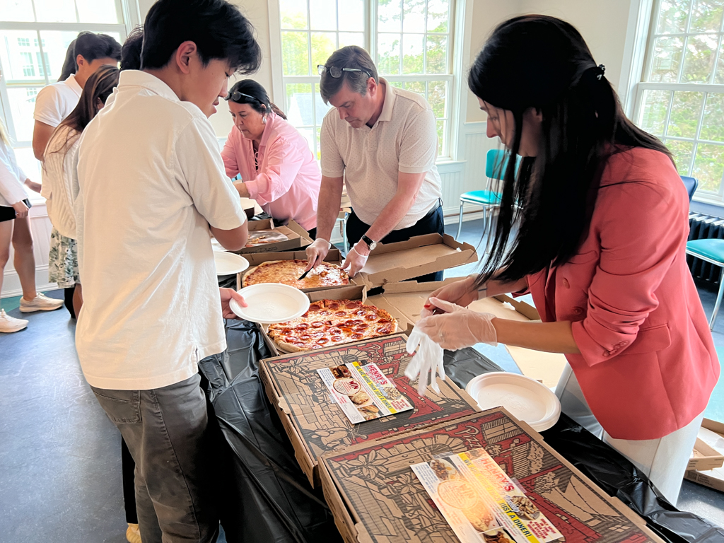 The ninth-grade class gathered one last time at the year's end to reflect upon their time at Rectory and to think about life after graduation. Before enjoying some pizza, students were invited to write a letter to their future self, which will be given to them in ten years' time.