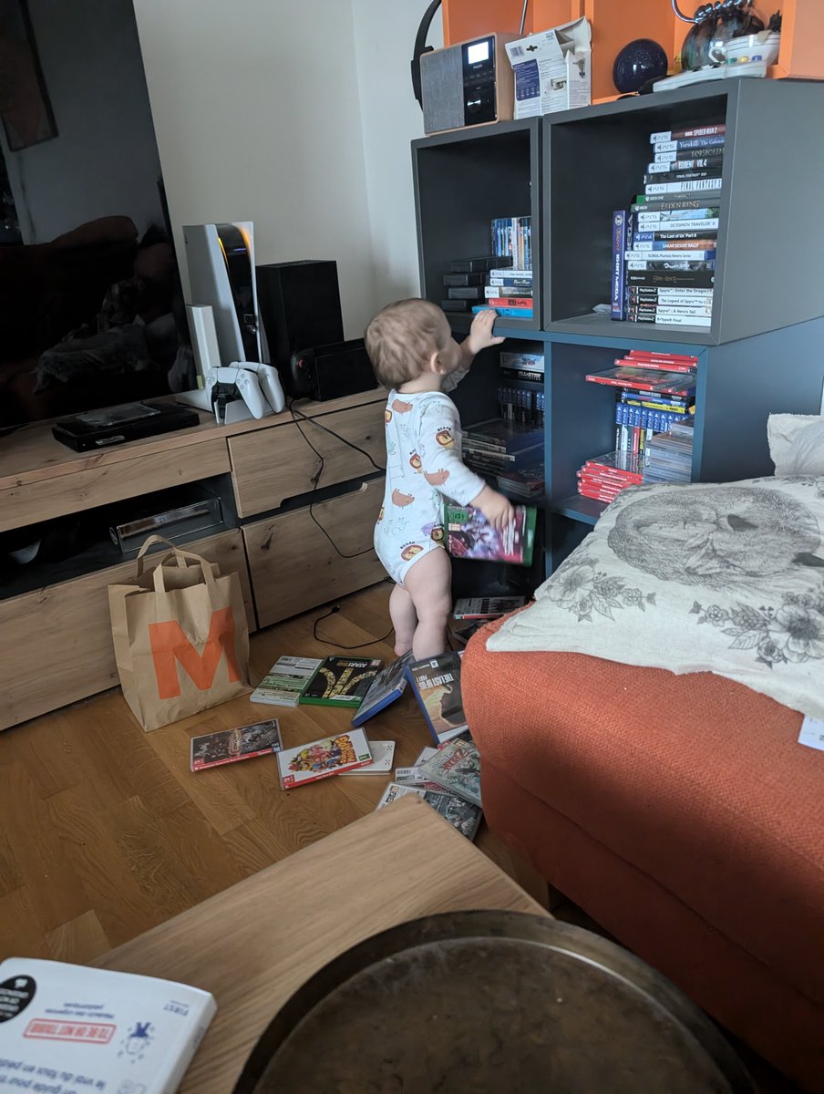 WearingFin's tweet photo. Mini-Fin is currently picking out the game to submit... Assuming any are left on the shelf. https://t.co/PYtVZ9AXLO