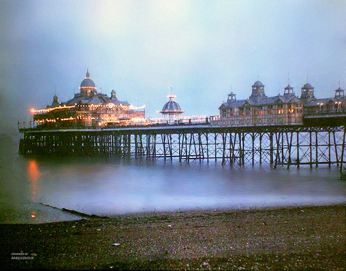 Is there anything more evocative than Edwardian twilight? I have cleaned &amp; enhanced this early English autochrome, capturing the illuminations of Eastbourne Pier in the evening gloaming of 1910. It was taken by Ellis Kelsey 114 years ago and is an original colour photograph (not