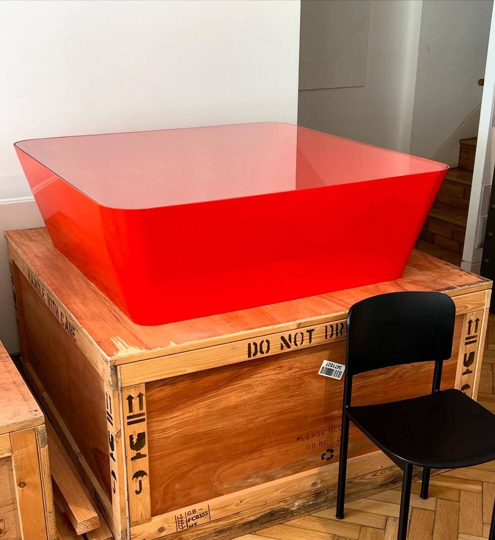 From the archive. Inspecting the condition of the first prototype of our Zero-in table from 2005. Made from hand formed aluminium and orange car body paint. @establishedandsons instagr.am/p/C8ue2XMoRck/