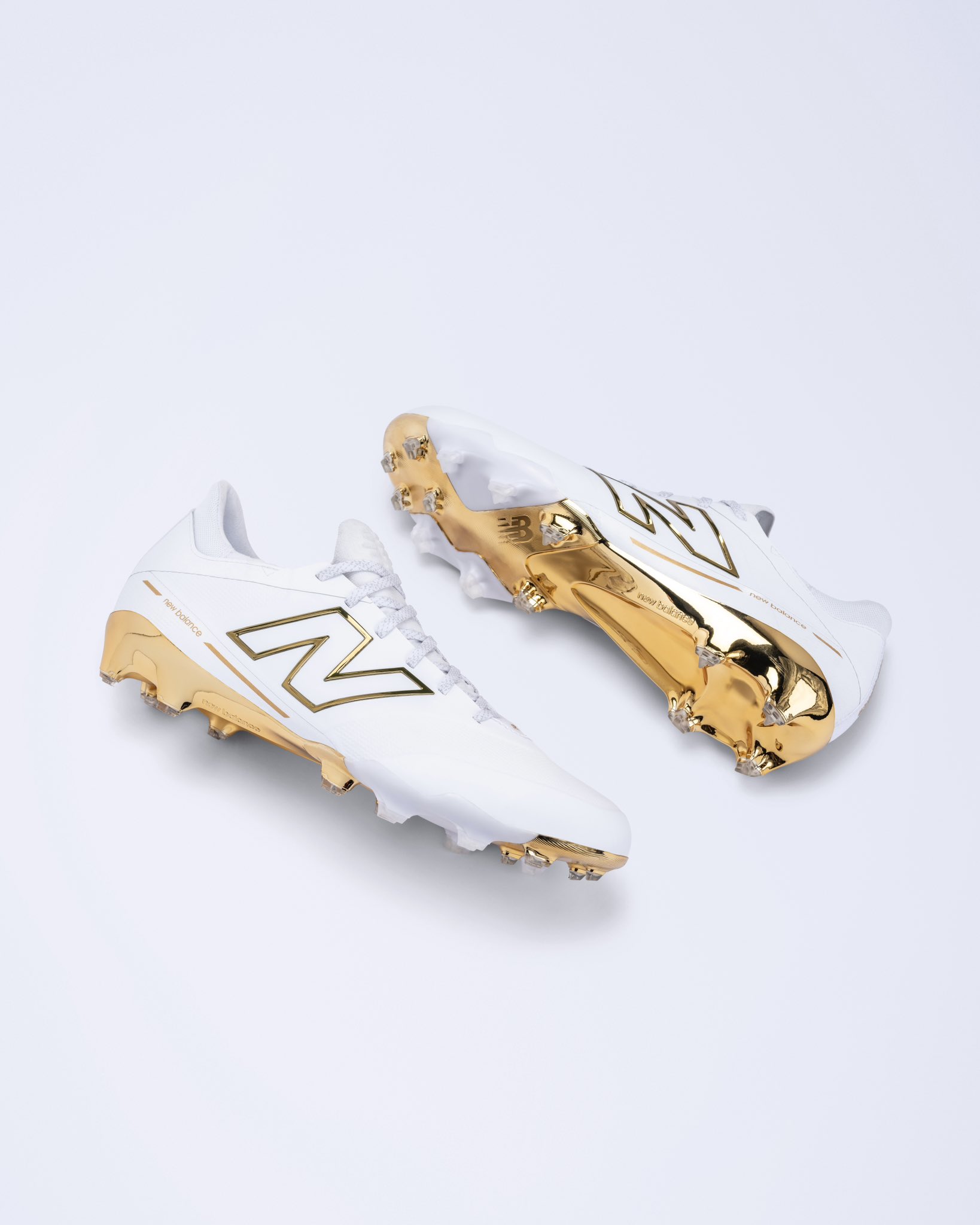 New balance gold bottom cleats hotsell