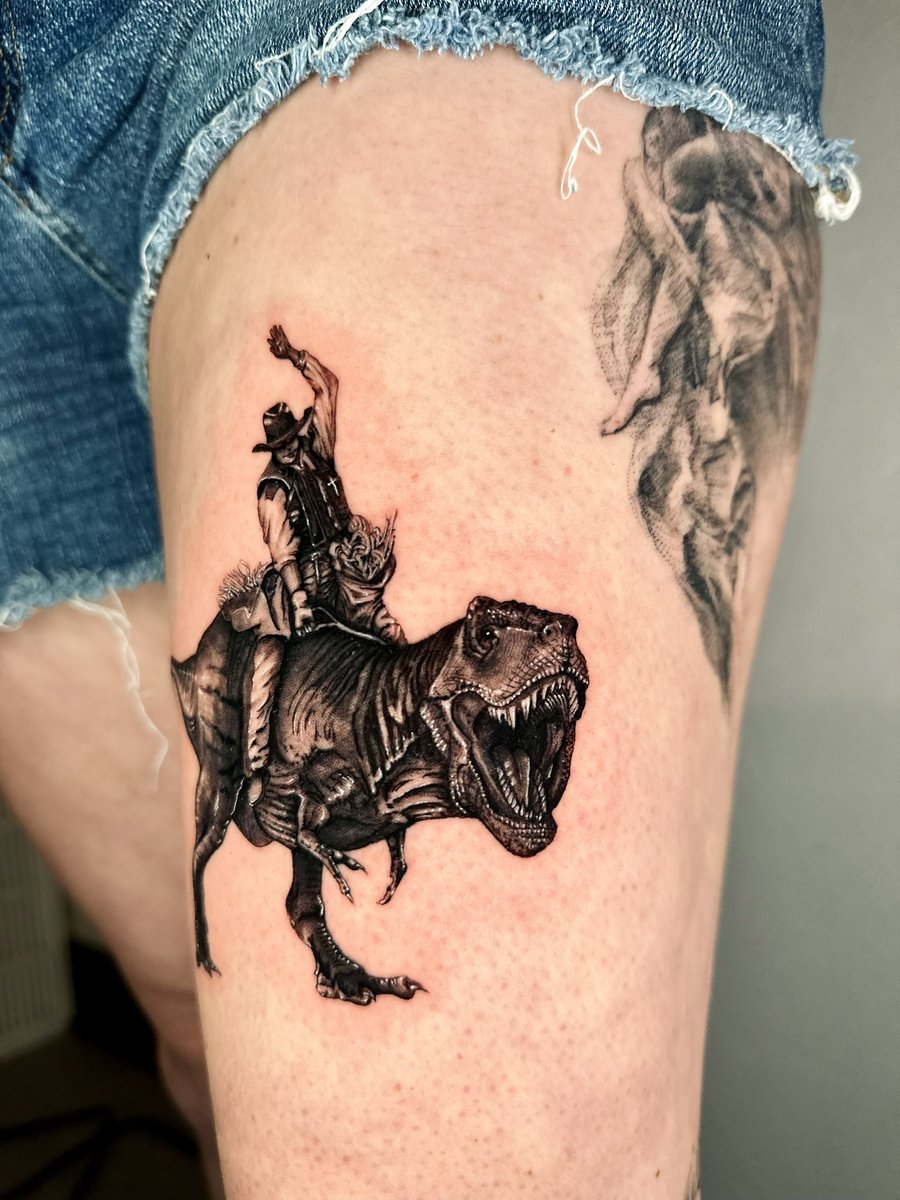KaylynRhoad's tweet photo. cowboy riding a dinosaur tattoo 🤩🦖 https://t.co/SvfIjaxLqN