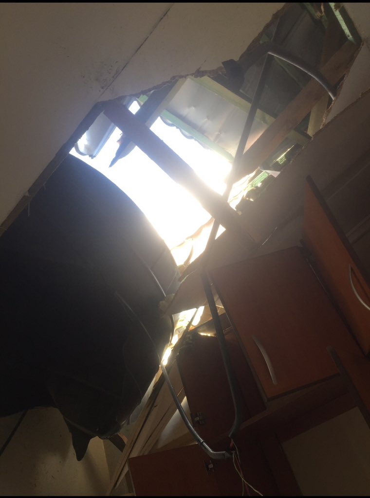 A ground-level view of how water tank broke its way through Nyar Kendu's house ceilings