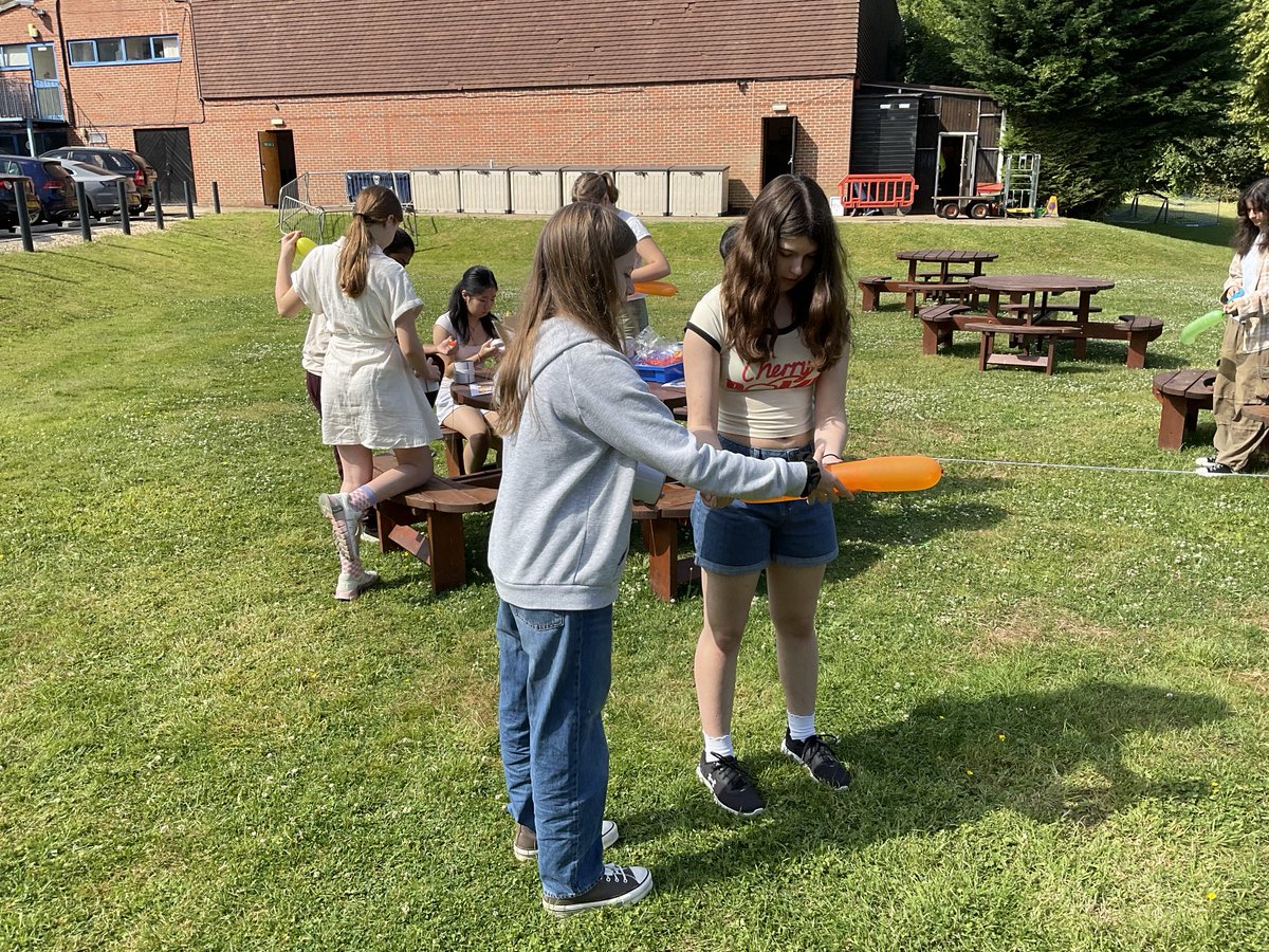 Physics workshop in Activities Week Science Camp - making mini motors and rocket-propelled cable cars.