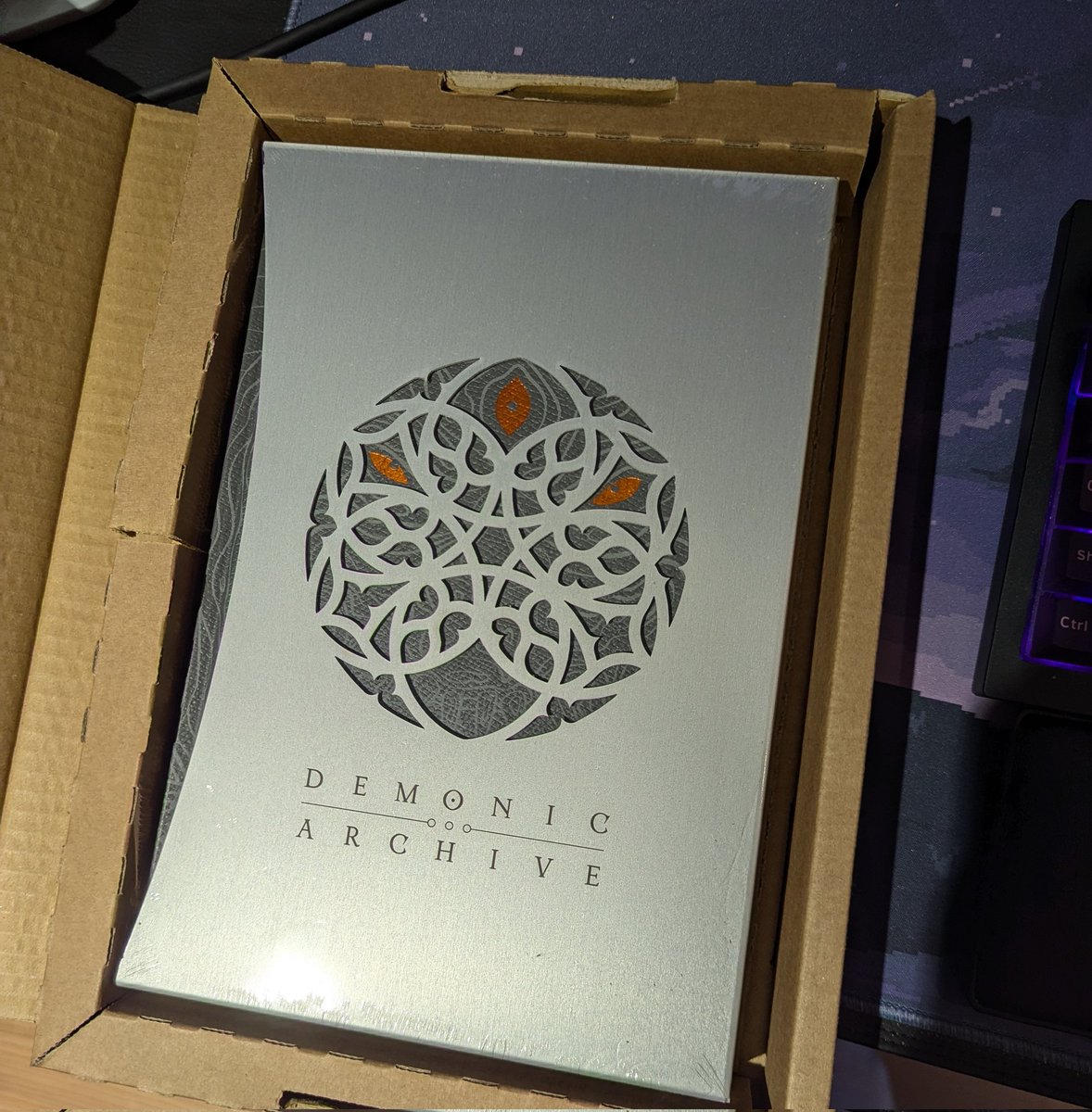TNT_303's tweet photo. Just received my copy of Demonic Archive from @tuneandfair of author and Souls scholar @Lokey_DS.
It looks amazing! It will go well in my collection with Abyssal Archive. https://t.co/p60zgjGDFn