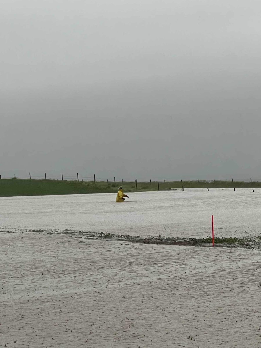 Some images being sent to me. Workers trying to locate a road under the water near Smiley #Saskatchewan #skstorm