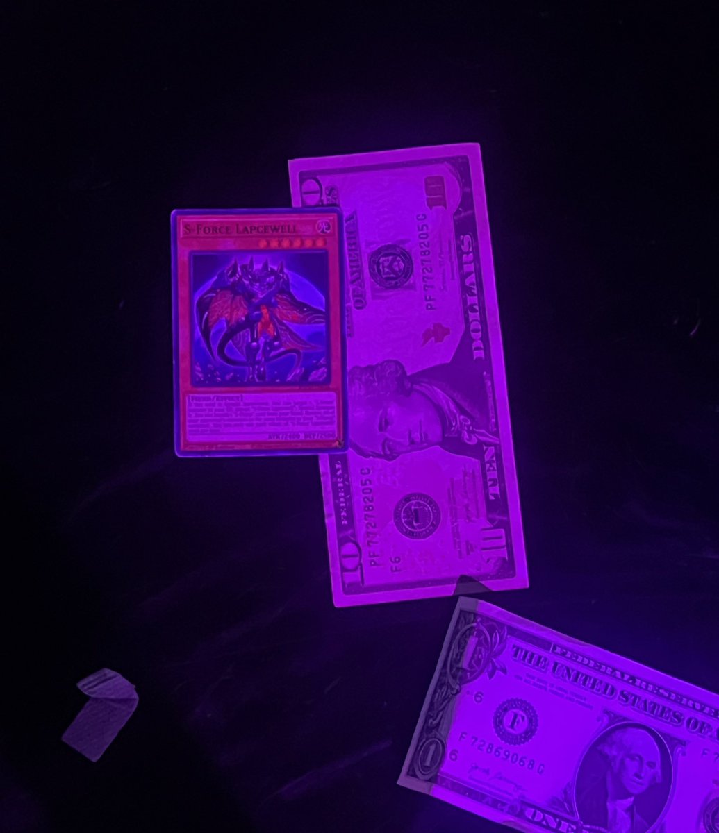 i’m not sure what type of feral energy is in the air, but i got tipped a Yu-Gi-Oh! card on stage