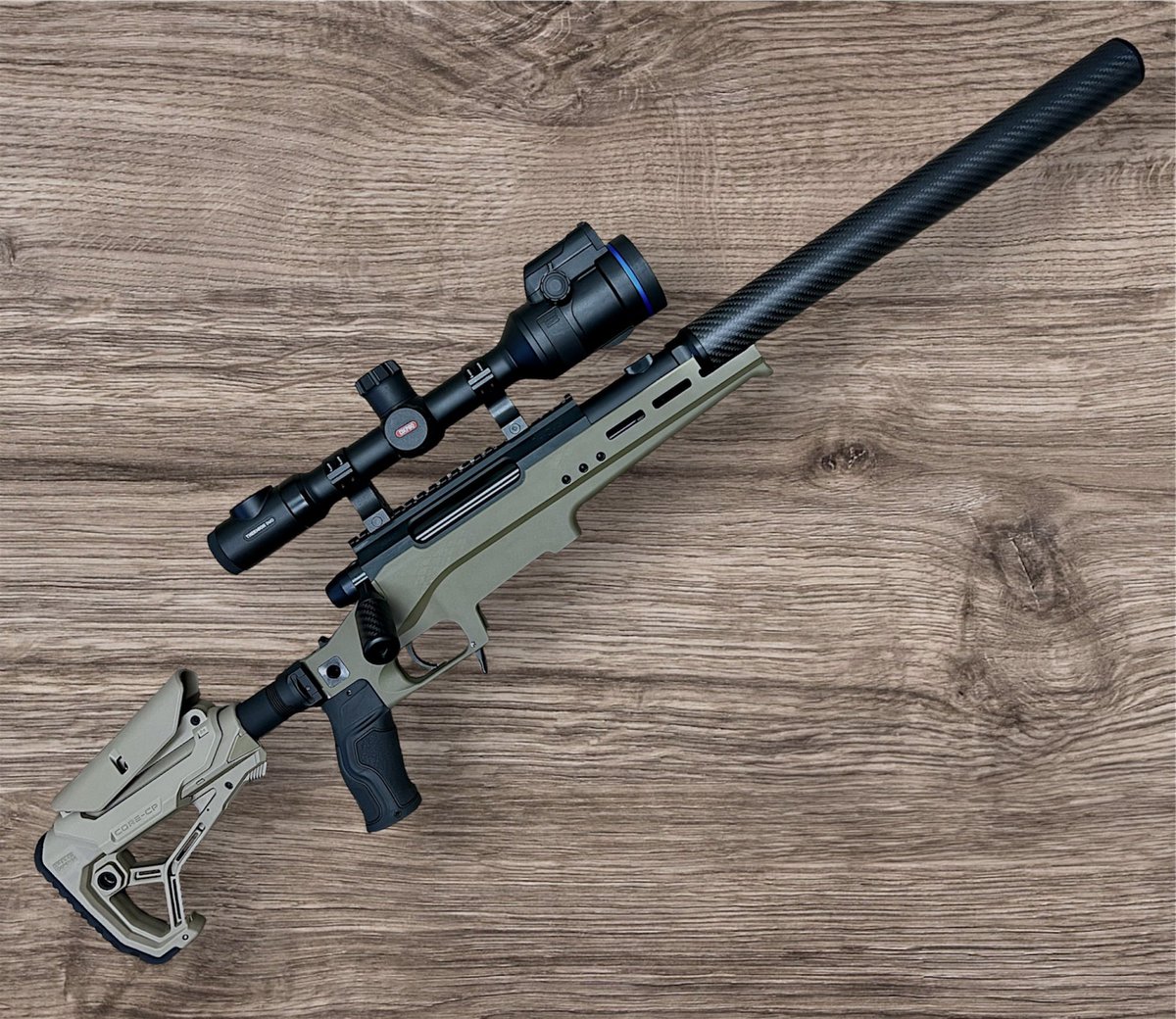 Longbowbb's tweet image. Was asked if the XXL suppressor could fit the Tac-41 Lite chassis. 

Normally, no…..
…but as if I going to stop there!

Few choice cuts, touch of sanding and a light respray and im liking the look of this. 

Your thoughts?
