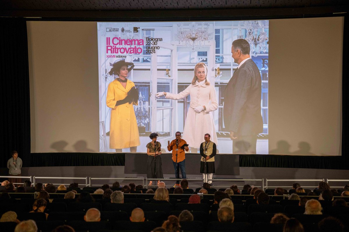 FHF_Official's tweet photo. FHF's restoration of Nirad Mohapatra's "Maya Miriga" premiered to a full house at the Il Cinema Ritrovato Festival in Bologna yesterday. The film was presented by FHF Director Shivendra Singh Dungarpur and Sandeep Mohapatra, the son of the filmmaker... photos by @Silentvalerio https://t.co/v55yGax4ZM