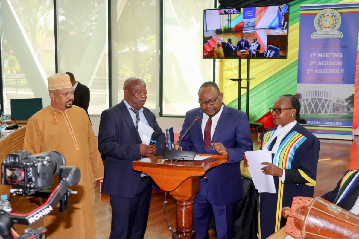 liaison54538's tweet photo. Hon. @DMazenga, the newly appointed DRC Minister for EAC Affairs, was sworn in as an Ex-Officio Member of the @EA_Bunge  during today's sitting.
#March2Parliament #StopCorruption #RutoMustGo
#Roadtostaehouse #OccupyStateHouseNairobi
#RutoMustGoHome #RutoIsAWesternPuppet https://t.co/WOxjqmnyH2