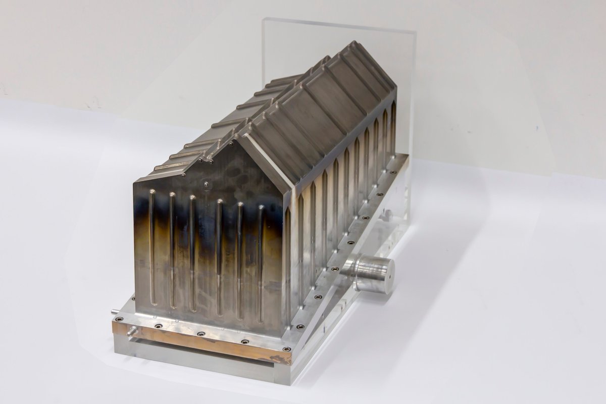 MarcoJKraan's tweet photo. Today the @LHCbExperiment  VELO is placed on the @_nikhef  Expostrip with two real VELO pixel detectors and a cut-through RF Box. 
The question is whether Nikhef LHCb project leader @MarcelMerk  likes it? https://t.co/fzt1Mhqlmr