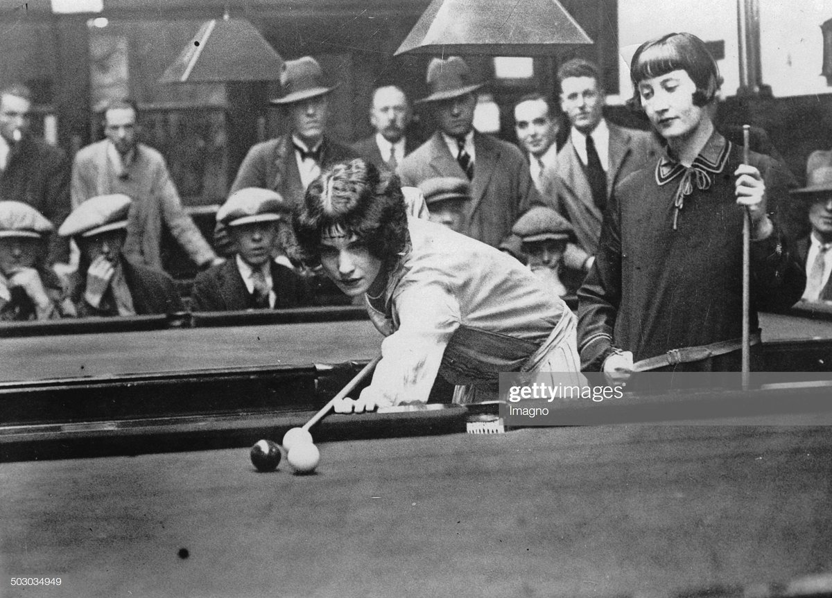 London's Miss Gardner (left) and Glasgow's Miss Lennan (right) at the British Women's Billiard Championship in The Glevum Billiard Hall in Gloucester. c. 1930