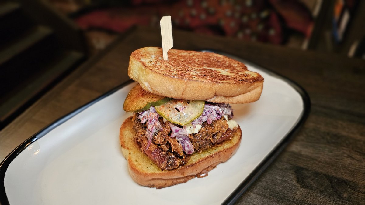 Goodbye, Beach Bod, but Hellooooo, #Fryday! 𝗡𝗔𝗦𝗛𝗩𝗜𝗟𝗟𝗘 𝗧𝗢𝗔𝗦𝗧 - Nashville Hot Chicken, Texas Toast, Miso Butter, B&amp;B Pickles, Charred Cabbage Slaw. Get it at the five-star dive bar!