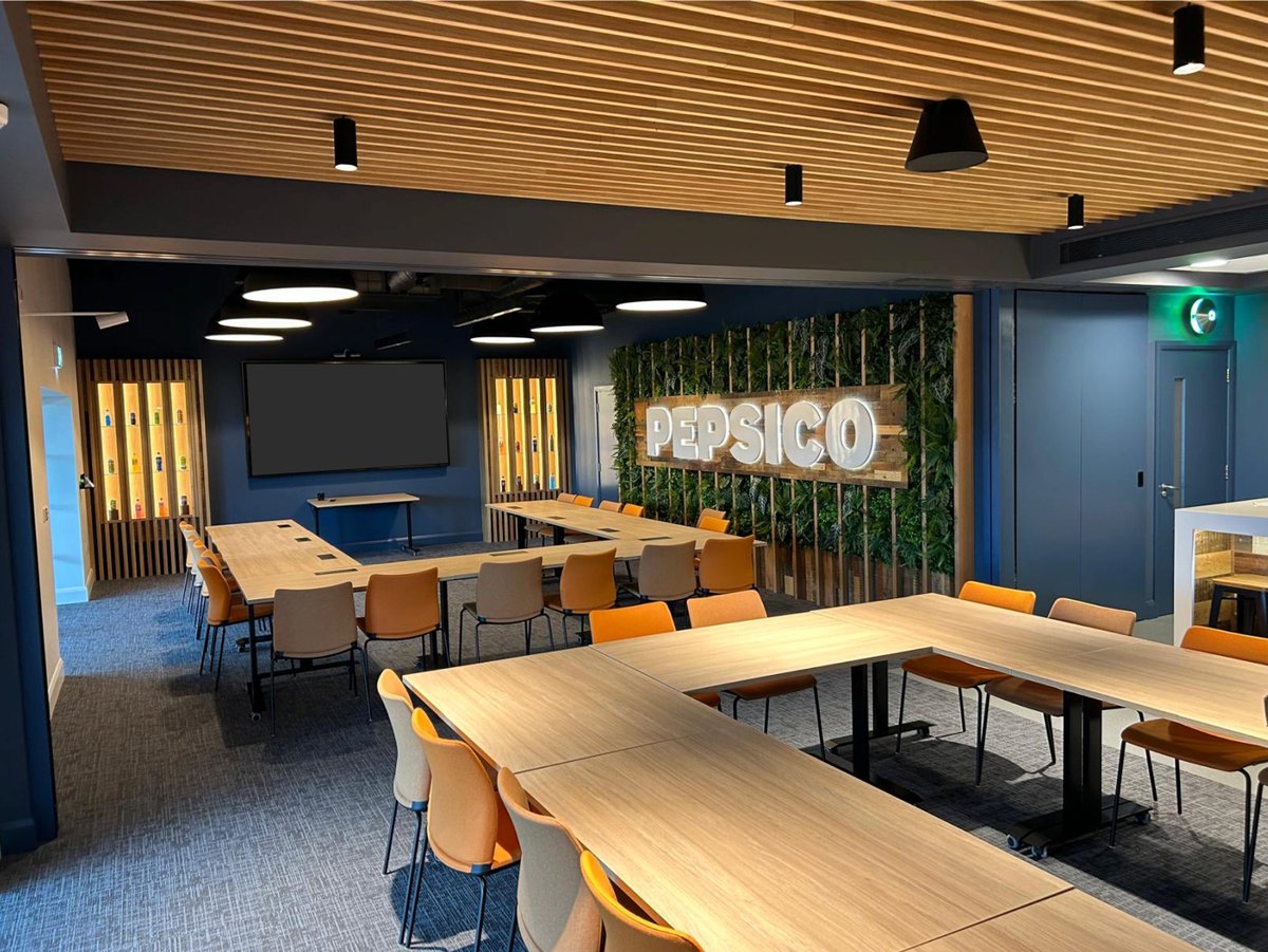 PepsiCo’s Innovation Hub-a multifunctional space with option of one or 2 rooms, different table configurations, a meeting space with excellent technology, a kitchen to mix, heat and display tester products, coffee and chill out area in a relaxed soft industrial atmosphere.