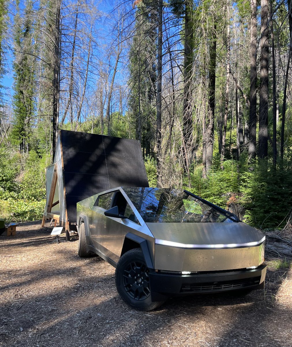 hudzah's tweet photo. the squad pulled up and ran a night market in the forest – powered by solar a-frames we built and a cybertruck! https://t.co/nmMcJdLrpL