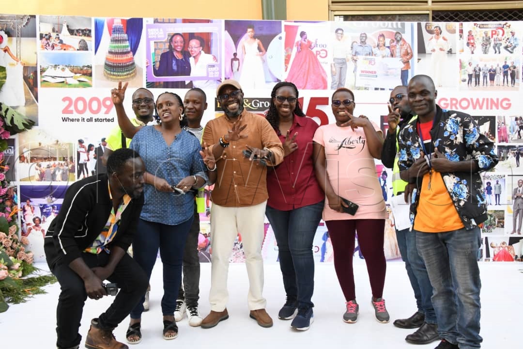 newvisionwire's tweet photo. #BrideAndGroomExpo: @VisionGroup employees capturing unforgettable moments with the man who signs the pay cheques - CEO @nyamadon 

📸: Mpalanyi Ssentongo https://t.co/5z3TmEQbfJ