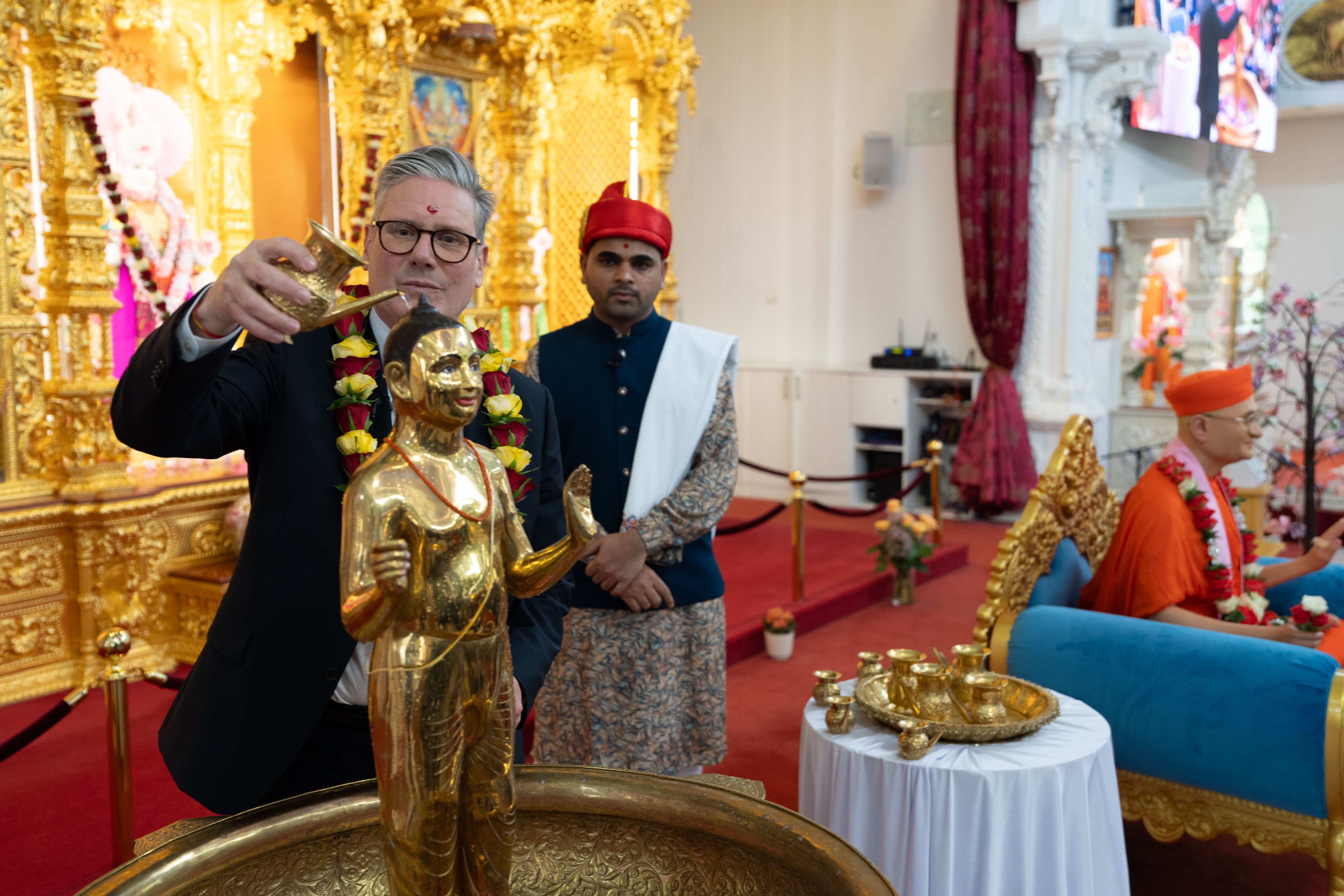 A photograph of Keir Starmer at Kingsbury temple