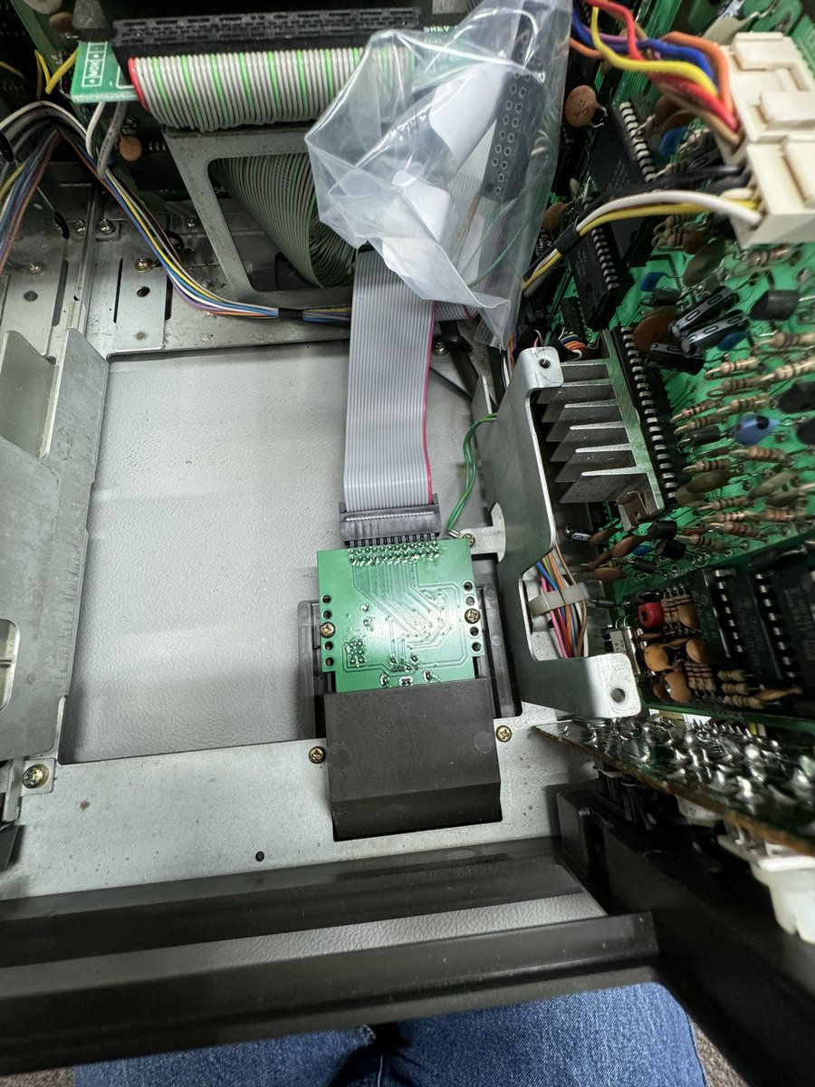 <a href="/grandoldian/">Ian Cudlip</a> and I made a prototype ps2 to sx64 keyboard adapter to fit where the old keyboard connector went.

Both of my sx64’s have no keyboards.

Had to make a slight mod to the case, bend over a bit of plastic (which you cant see) to get the ps2 socket in place.