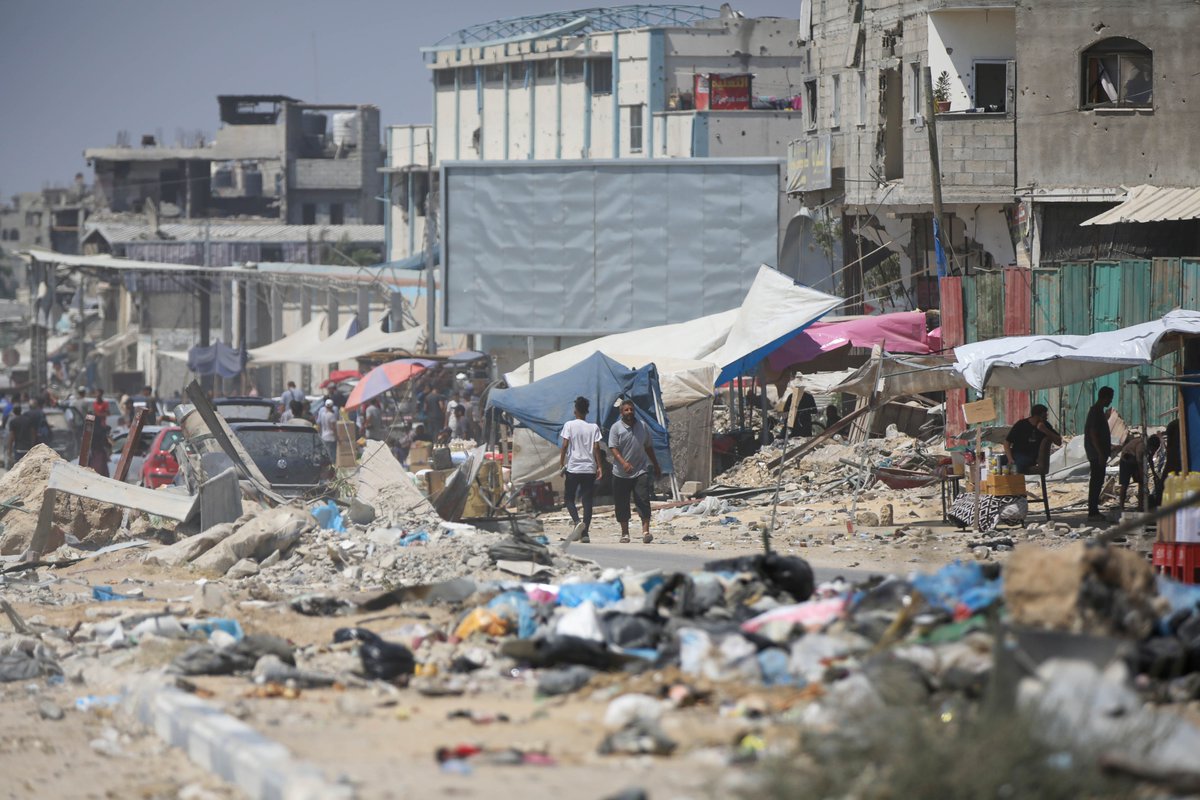 UNRWA's tweet photo. "Trash is piling up everywhere, people are living under plastic sheeting where temperatures soar.” @UNWateridge 

Families in #Gaza live next to mountains of garbage and sewage. With very few bathrooms available and unbearable summer heat, the sanitary conditions are desperate. https://t.co/V8Q0H7Np7P