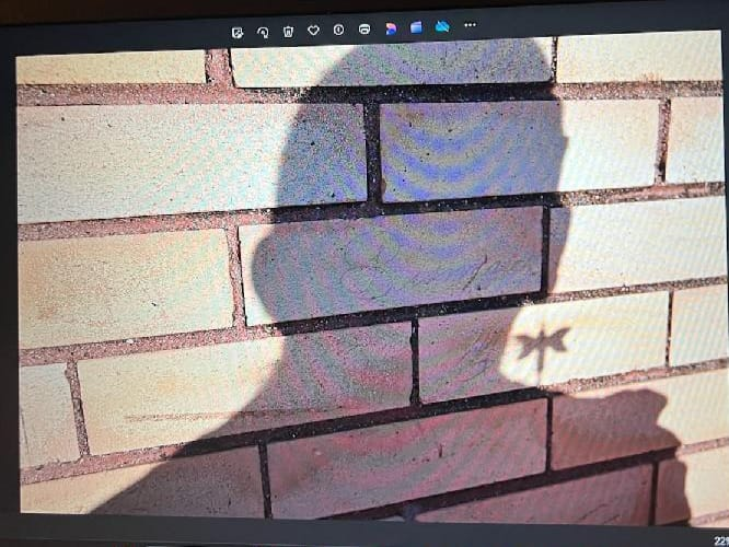 DLajimodiere's tweet image. Bismarck B. Sch.(ND). Some students wrote on the bricks in pencil, some of which are now over a hundred years old. They are fading, but there is no safe way to preseve them.  Photo taken of my dragonfly earring shadow by Lacey Kinnart. #NABS #OHP #BoardingSchoolHealin