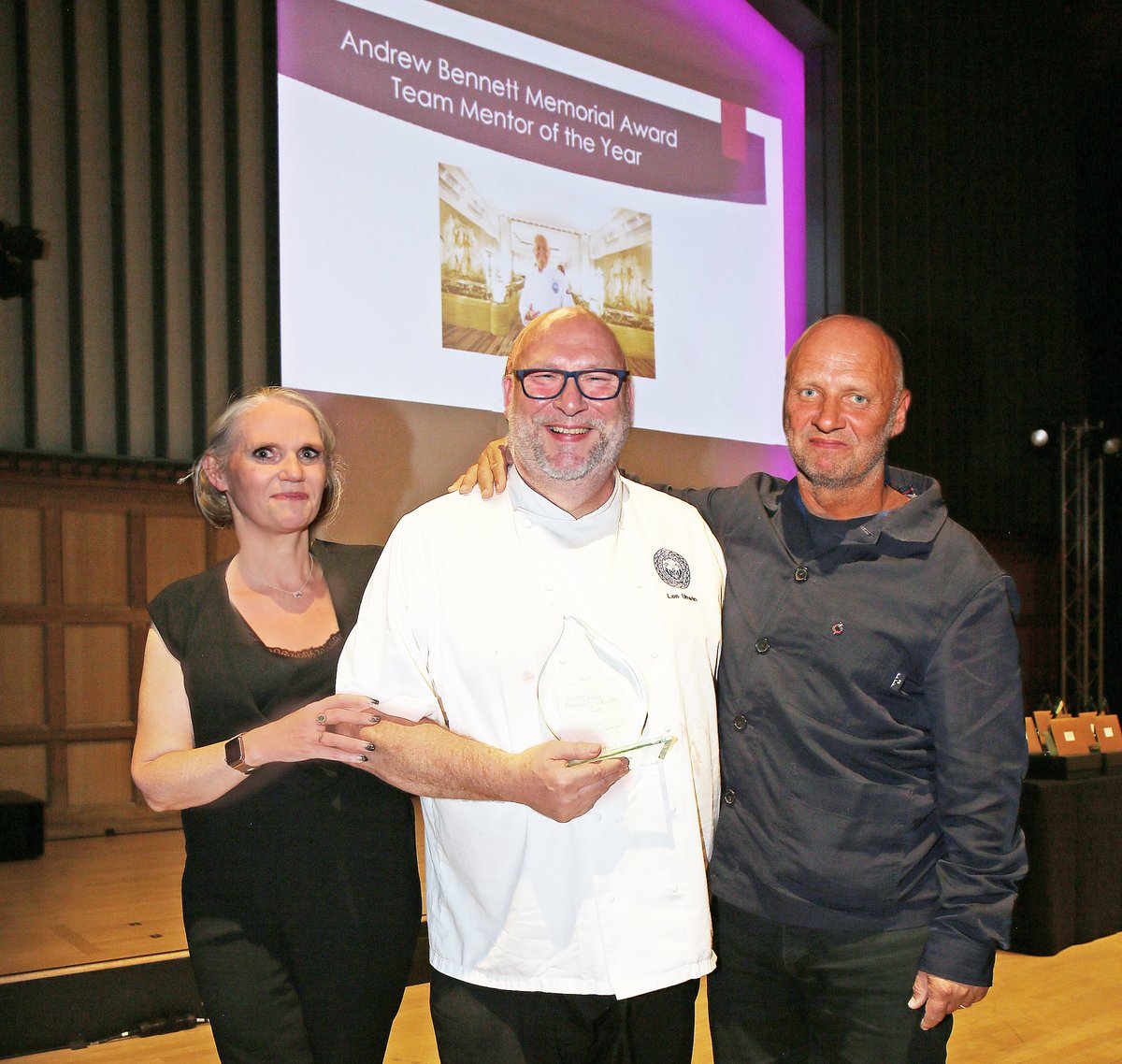 Many congratulations to <a href="/lenunwin/">Len Unwin</a> Winner of the Andrew Bennett Award for Mentor of the Year at UK
Young Restaurant Team of the Year <a href="/RestaurantYoung/">UK Young Restaurant</a> pictured with <a href="/simon_rogan/">Simon Rogan</a> and Vicky Enderson Chair of Judges <a href="/mskingredients/">MSK INGREDIENTS LTD</a>