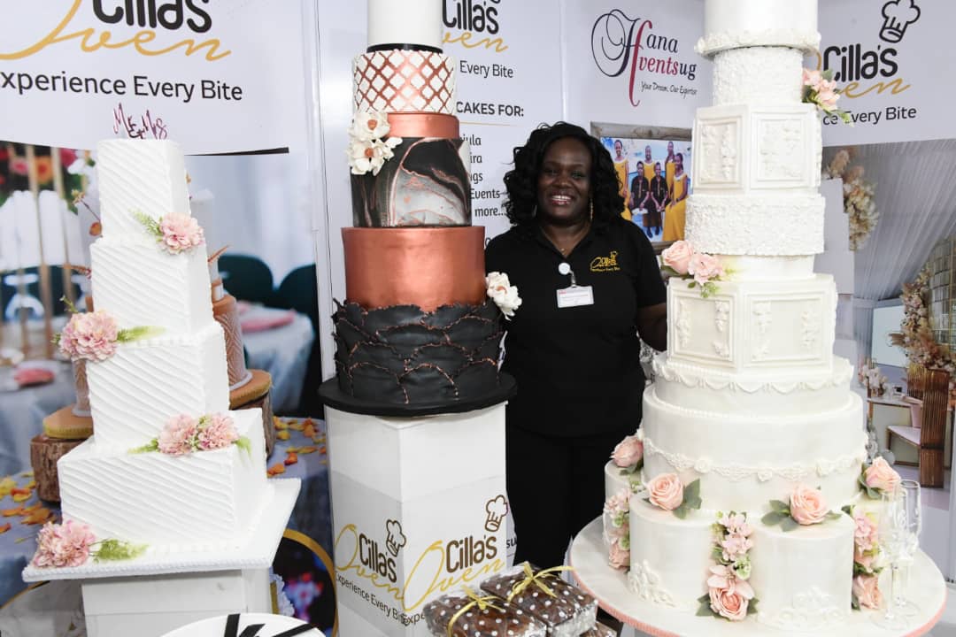VisionGroup's tweet photo. Wow! Priscilla Anne Mugerwa, Managing Director of Cilla's Oven, displaying her stunning cakes at #BrideAndGroomExpo. https://t.co/ExdhyI9BFG