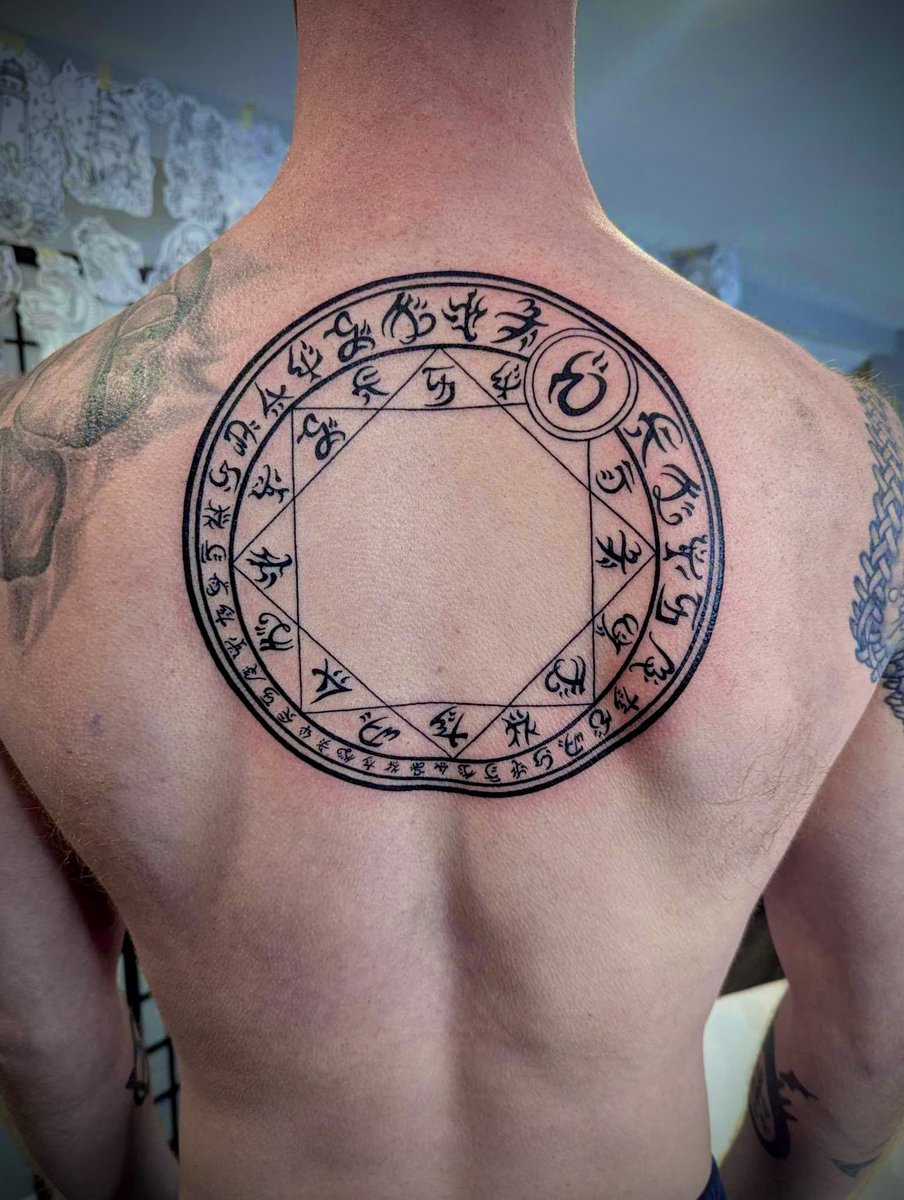 No coreling can get the drop on Matt Evon with his new warded circle back  tattoo, freshly inked by Erik Mueller at Sanctuary Tattoo in Erie, PA., image size:904x1200
