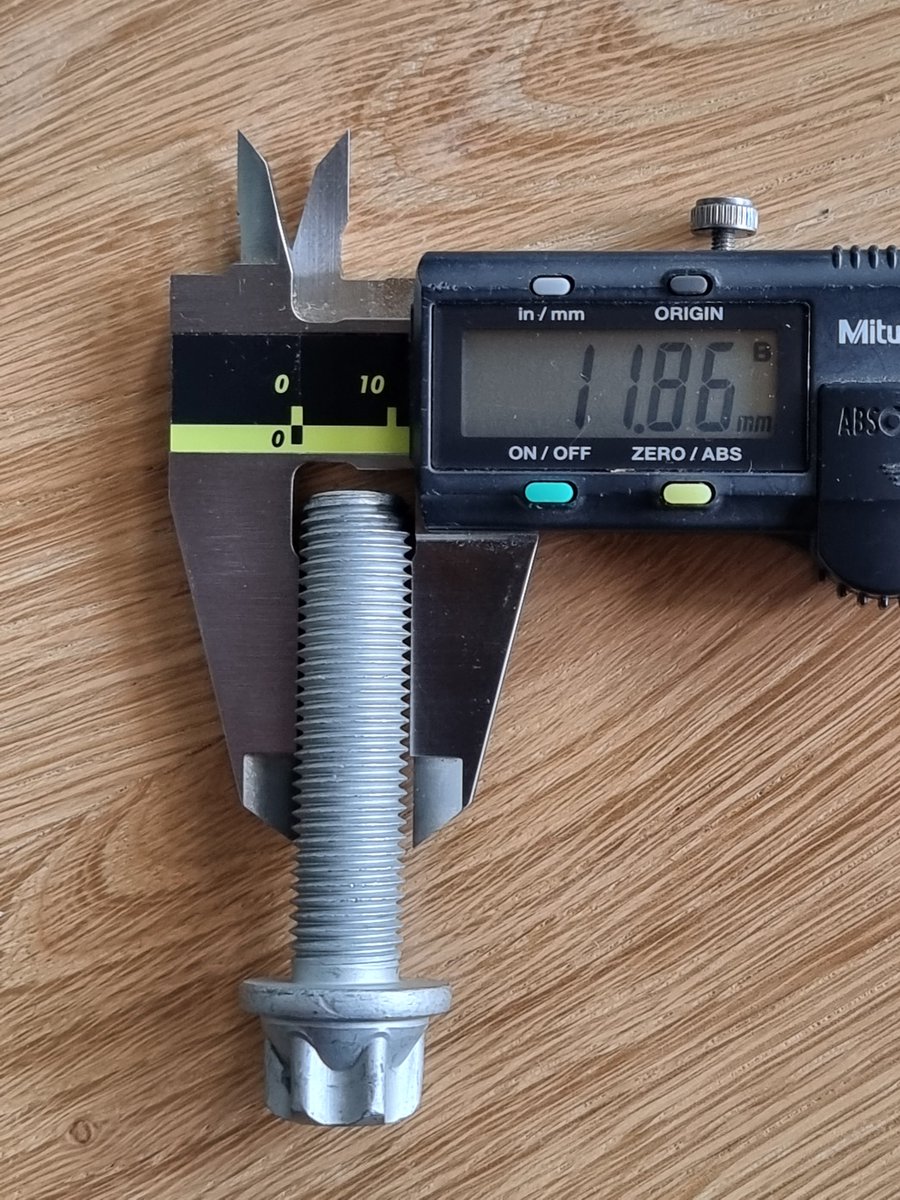 How do I find out what thread this is??? It ALMOST fits into an M12 nut before jamming. Imperial perhaps, or is it a different thread coarseness?